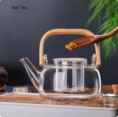 1000ml Glass Tea Kettle with Glass Filter & Wooden Handle - Techmanistan in Pakistan