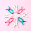 4 Pcs Plastic Big Clothes Pegs - Techmanistan in Pakistan