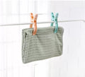 4 Pcs Plastic Big Clothes Pegs - Techmanistan in Pakistan
