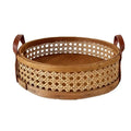 Techmanistan's Hand Woven Round Rattan Baskets feature a wooden base and leather handles. The sides display intricate patterns of interlaced bamboo strips, and the baskets have a natural, rustic appearance. Perfect as part of a handwoven serving trays collection.