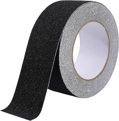 Roll of black anti-slip tape on a white background