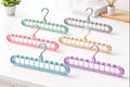 Multi-layer wardrobe organizer with rotating hook for efficient space saving storage
