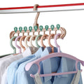 Set of colorful hangers with numbered hooks on a white background