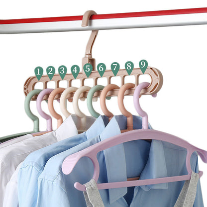 Set of colorful hangers with numbered hooks on a white background