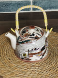 Multicolored Ceramic Teapot With Rattan Handle Techmanistan