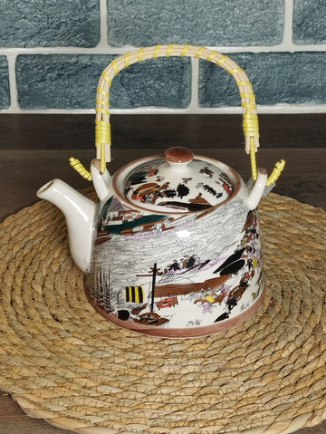 Multicolored Ceramic Teapot With Rattan Handle