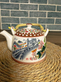 Multicolored Ceramic Teapot With Rattan Handle Techmanistan