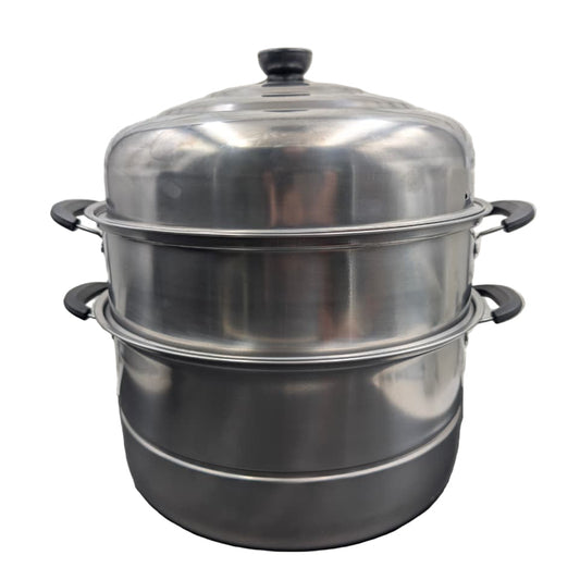 Stainless steel steamer pot on a white background