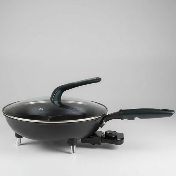 Electric frying pan on a tiled floor