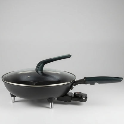 Electric frying pan on a tiled floor