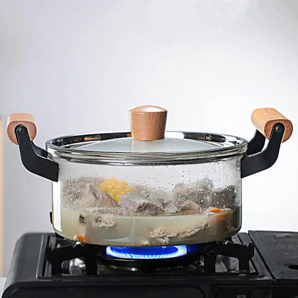 Clear Glass Pot with Stainless Steel Lid & Wooden Handle - Techmanistan in Pakistan