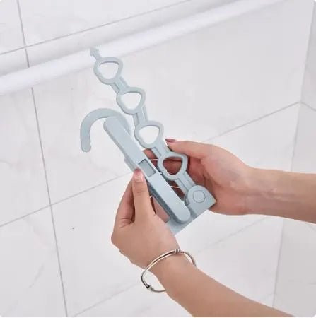 Folding Clothes Drying Hanger with 4 Rotating Hooks - Techmanistan in Pakistan